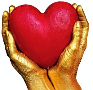 heart, two, gold, golden, yellow, red, love, 2, art, assist, carry, confidence, faith, fingers, grey, hands, heart, helping, hold, human, love, support, trust, underarm, left, right